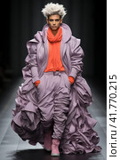 Man on the catwalk, creative fashion show,  Generative AI. Стоковое AI-изображение, AI-художник Анна Кривицкая / Фотобанк Лори
