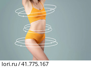 Hip, abdomen liposuction, breast augmentation, fat and cellulite removal concept, female body with painted lines. Стоковое фото, фотограф Станислав Тарко / Фотобанк Лори