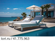 Sea view. Luxury modern white beach hotel with swimming pool. Sunbed on sundeck for vacation home or hotel. Стоковое AI-изображение, AI-художник Ирина Михайличенко / Фотобанк Лори