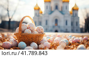 Корзинка с разноцветными пасхальными яйцами на фоне золотых куполов церкви. Стоковое AI-изображение, AI-художник Щеголева Ольга / Фотобанк Лори