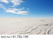 Antarctic desert landscape, empty cold snow plain under blue sky. Стоковое AI-изображение, AI-художник Евгений Харитонов / Фотобанк Лори