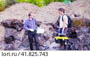 Ecologist walking at the place where the forest burned down. Стоковое видео, видеограф Chudakov_Ivan / Фотобанк Лори