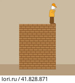 A man stands on the edge of a brick wall and looks down. Стоковая иллюстрация, иллюстратор Карпенко Алексей / Фотобанк Лори