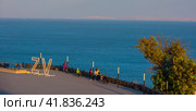 Site on top of Mount Mithridates overlooking Kerch Strait and bridge on rainy summer day, Kerch, Crimea, Russia 2022. Редакционное фото, фотограф Анна Кривицкая / Фотобанк Лори