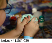 Photography of slime preparation. Master Class. Children' hands. Concepts of education, skills  development, game and childhood. Стоковое фото, фотограф YuryKara / Фотобанк Лори
