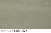 Soft Muslin Detailed Texture. Natural Cotton Fabric Closeup Pattern. Khaki Green Light Chintz Surface. Rotation, Macro. Cozy Textile Background. Clothes Production. Melange Yarn. 4K Shot. Стоковое видео, видеограф Марина Демидюк / Фотобанк Лори