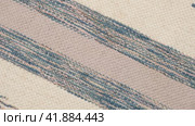 Soft Knitted Woolen Detailed Texture. Natural Fabric Closeup Knit Pattern. Striped Knitwear, Warm Cashmere Surface. Rotation, Macro. Cozy Textile Background. Clothes Production. Melange Yarn. 4K Shot. Стоковое видео, видеограф Марина Демидюк / Фотобанк Лори