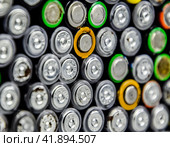 Salt and alkaline batteries, source of energy for portable technology. AAA and AA batteries. Стоковое фото, фотограф Леонид Еремейчук / Фотобанк Лори