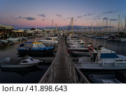 PLAYA BLANCA, LANZAROTE - OCTOBER 25, 2023: Evening on Marina Rubicon of Playa Blanca. Playa Blanca is the southernmost town of the Spanish island of Lanzarote. It is the newest resort on the island. Редакционное фото, фотограф Sergey Kohl / Фотобанк Лори