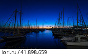 PLAYA BLANCA, LANZAROTE - OCTOBER 25, 2023: Evening on Marina Rubicon of Playa Blanca. Playa Blanca is the southernmost town of the Spanish island of Lanzarote. It is the newest resort on the island. Редакционное фото, фотограф Sergey Kohl / Фотобанк Лори