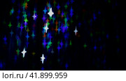 Dark festive background with shimmering rainbow star-shaped bokeh. Стоковое видео, видеограф Светлана Ильева (Иванова) / Фотобанк Лори