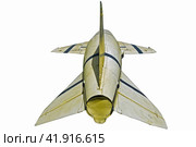 Старая противокорабельная ракета на белом фоне. An old anti-ship missile on a white background. (2011 год). Редакционное фото, фотограф Татьяна Д / Фотобанк Лори