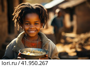 The problem of poverty and inequality. Happy african kid eating some sorghum porridge in village outdoor. Стоковое AI-изображение, AI-художник Ирина Михайличенко / Фотобанк Лори