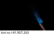 Gas burner flame. Blue fire isolated on black background, close-up. Blue flame switched on from nozzle of gas torch. Flame of manual Butane burner. VFX, Compositing as jet rocket propulsion, spaceship. Стоковое видео, видеограф Марина Демидюк / Фотобанк Лори