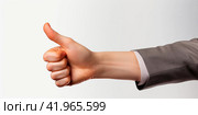 A man's hand on a white background, with a short sleeve suit showing a thumbs up. The concept of luck and success. Isolated. Стоковое AI-изображение, AI-художник Ярославский Максим / Фотобанк Лори