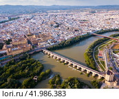 Mosque-Cathedral of Cordoba and Roman Bridge over the Guadalquivir. Стоковое фото, фотограф Яков Филимонов / Фотобанк Лори