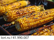 Fresh and delicious grilled corn, Image for menu, cafe, restaurant. Стоковое AI-изображение, AI-художник Ирина Ручушкина / Фотобанк Лори