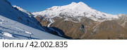 The white peaks of the highest mountain in Europe. Panorama in the mountains. Vacation at the ski resort. Vacation in the mountains. The dormant volcano Elbrus. The conquest of the mountains. Стоковое фото, фотограф Эдуард Белкин / Фотобанк Лори