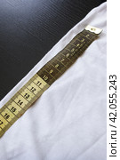 Measuring tape on white fabric close up. Стоковое фото, фотограф Аксенова Вера / Фотобанк Лори