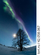Northern lights reflected in the water. Стоковое фото, фотограф Данил Хусаинов / Фотобанк Лори