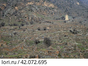 Abaev Tower, defensive structure of late Middle Ages in village of Kyunnyum, destroyed after deportation of Balkar people in spring, village of Upper Balkaria, Kabardino-Balkarian Republic, Russia (2023 год). Стоковое фото, фотограф Алексей Антипов / Фотобанк Лори