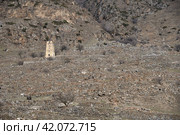 Abaev Tower, defensive structure of late Middle Ages in village of Kyunnyum, destroyed after deportation of Balkar people in spring, village of Upper Balkaria, Kabardino-Balkarian Republic, Russia (2023 год). Стоковое фото, фотограф Алексей Антипов / Фотобанк Лори