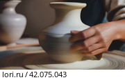 Potter's Skill: Clay is used to create a jug, embodying skill and creativity. Стоковое AI-видео, аниматор Юрий Поздников / Фотобанк Лори
