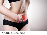 Woman with abdominal pain. Pain in the human body. Стоковое фото, фотограф Станислав Тарко / Фотобанк Лори