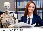 Молодая девушка и робот работают в офисе. Стоковое AI-изображение, AI-художник Щеголева Ольга / Фотобанк Лори