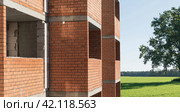 View of an apartment building under construction with balconies. Стоковое фото, фотограф Siarhei Starastau / Фотобанк Лори