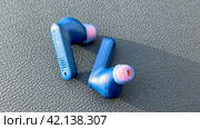 Moscow January 20 2024, JBL Wireless Earbuds. JBL Blue color Tune 230NC TWS Bluetooth wireless earphones\earbuds. Стоковое фото, фотограф Скрипачев Антон / Фотобанк Лори