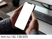 Мужчина держит смартфон, крупным планом руки. Смартфон с белым пустым экраном. Generative AI. Стоковое AI-изображение, AI-художник Щеголева Ольга / Фотобанк Лори