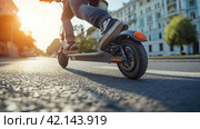 Man falling off an electric scooter. Стоковое AI-изображение, AI-художник Кирилл Черезов / Фотобанк Лори