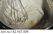 The process of making pancakes, the whisk whips the batter. Стоковое видео, видеограф Даниил Хабаров / Фотобанк Лори