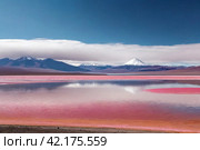 Scenery view of Laguna Colorada lake with pink chilean flamingos at Andes mountains background. Landscape photo of Bolivia in natural wilderness. Bolivian nature landmarks concept. Copy ad text space. Стоковое AI-изображение, AI-художник Aleksandr Golubev / Фотобанк Лори