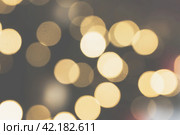 Abstract blurred bokeh light with warm tone color background concept. Стоковое фото, фотограф Глущенко Елена / Фотобанк Лори
