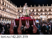 Religious brotherhood carrying paso of Flagellated Jesus during Holy Week procession (2022 год). Редакционное фото, фотограф Яков Филимонов / Фотобанк Лори