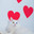 A white fluffy Angora cat with multicolored eyes lies impressively against the background of hearts. Стоковое фото, фотограф Неведицына Елена / Фотобанк Лори