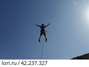 Man bungee jumping. Generate Ai. Стоковое AI-изображение, AI-художник Иван Рябоконь / Фотобанк Лори