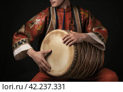 Man drum folk oriental. Generate Ai. Стоковое AI-изображение, AI-художник Иван Рябоконь / Фотобанк Лори