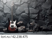 Stone wall electric guitar background. Generate Ai. Стоковое AI-изображение, AI-художник Иван Рябоконь / Фотобанк Лори