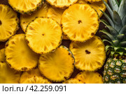 Pineapple slices background. Generate Ai. Стоковое AI-изображение, AI-художник Иван Рябоконь / Фотобанк Лори