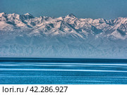 Sunset Issyk-Kul Kyrgyzstan, selective focus. Стоковое фото, фотограф Evgenii Predibailo / Фотобанк Лори