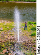 a large beautiful fountain on the banks of the Ai River, a landmark of Bashkortostan on a summer sunny day. Стоковое фото, фотограф Акиньшин Владимир / Фотобанк Лори
