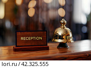 Стойка регистрации отеля с табличкой "Reception" Стоковое AI-изображение, AI-художник Щеголева Ольга / Фотобанк Лори