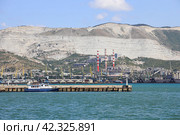 View of the sea port and Tsemesskaya bay. Russia, Novorossiysk, July 22, 2019. Редакционное фото, фотограф Сергей Н / Фотобанк Лори