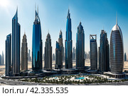 Panoramic view of silhouettes Dubai modern skyscrapers sunny summer day. Panorama of cityscape UAE city with new towers at blue sky. Construction and modern architecture concept. Copy ad text space. Стоковое AI-изображение, AI-художник Aleksandr Golubev / Фотобанк Лори