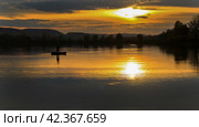 Sunset on the lake in summer. Стоковое фото, фотограф Винокуров Александр / Фотобанк Лори