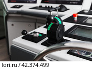 Azimuth thruster control levers, equipment of a tug boat control panel. Стоковое фото, фотограф EugeneSergeev / Фотобанк Лори