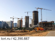 Belarus, Minsk - 07 february, 2024: Modern houses in Minsk world. Редакционное фото, фотограф Аксенова Вера / Фотобанк Лори